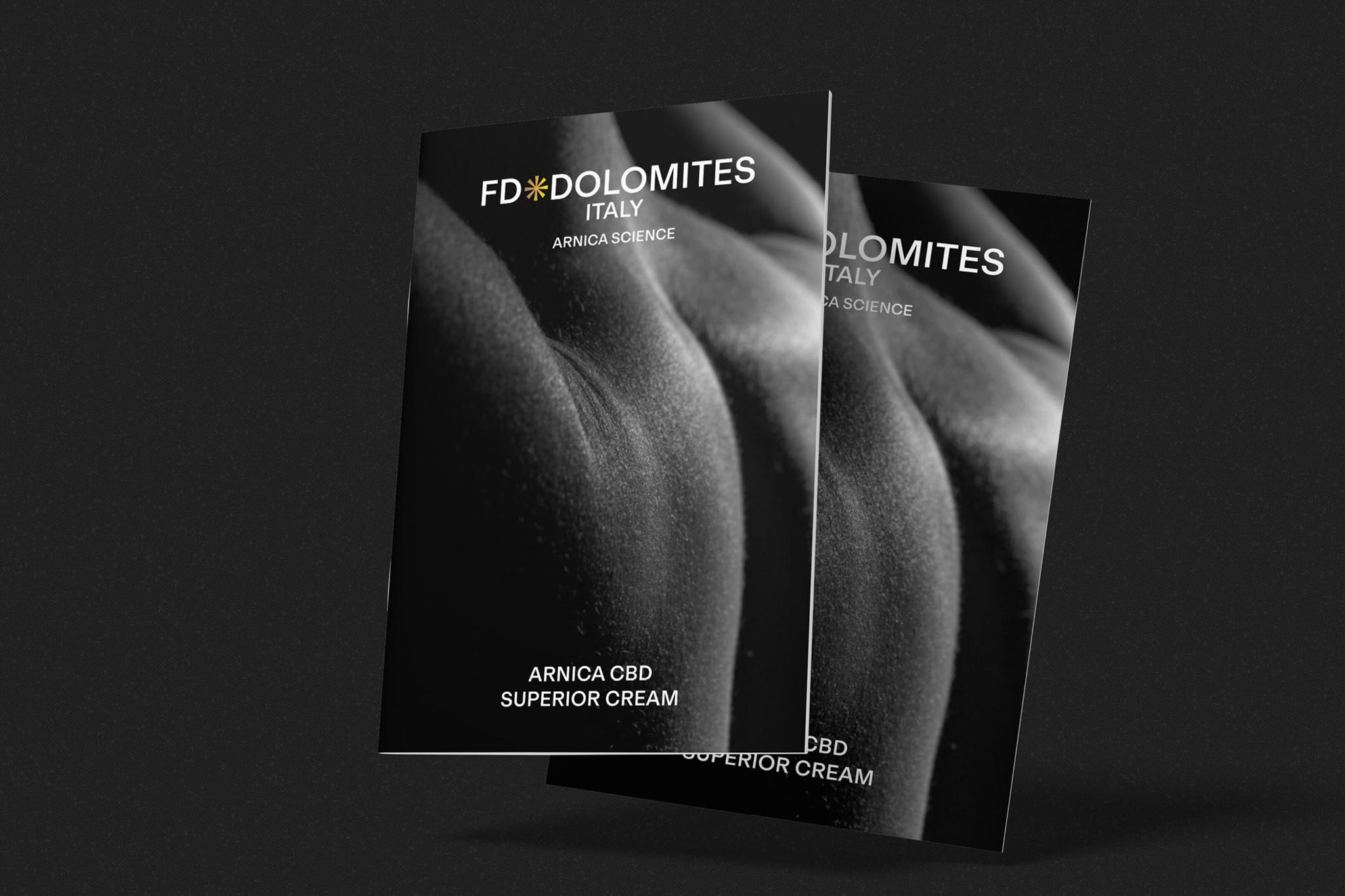 Schwarzes Produktdesign mit Schriftzug 'FD Dolomites Italy Arnica Science'.
